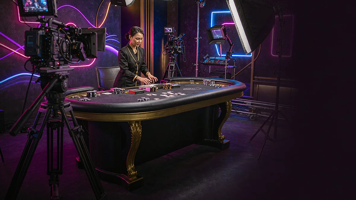 Camera and studio lighting facing a casino table
